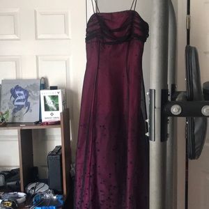 This beautiful dress has only been worn once.